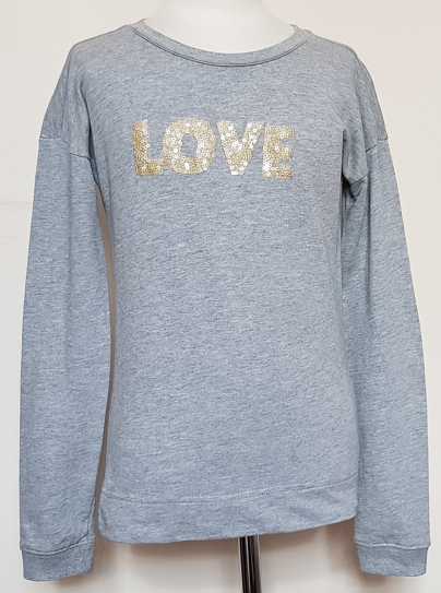 146.Hema grijze sweater met lover applicatie mt. 146/152