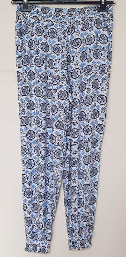 Divided witte soepelvallende broek met blauwe prints mt. 36