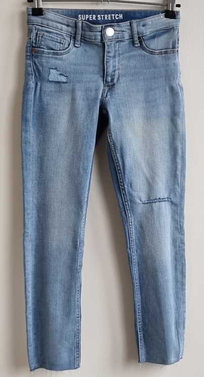 128.H & M super stretchy jeans met used look mt. 128