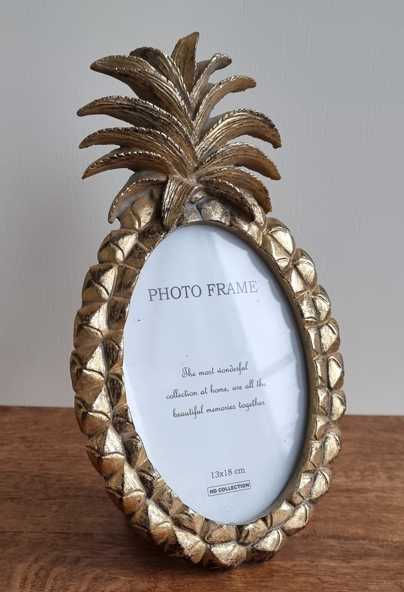 Goud fotolijstje in de vorm van een ananas